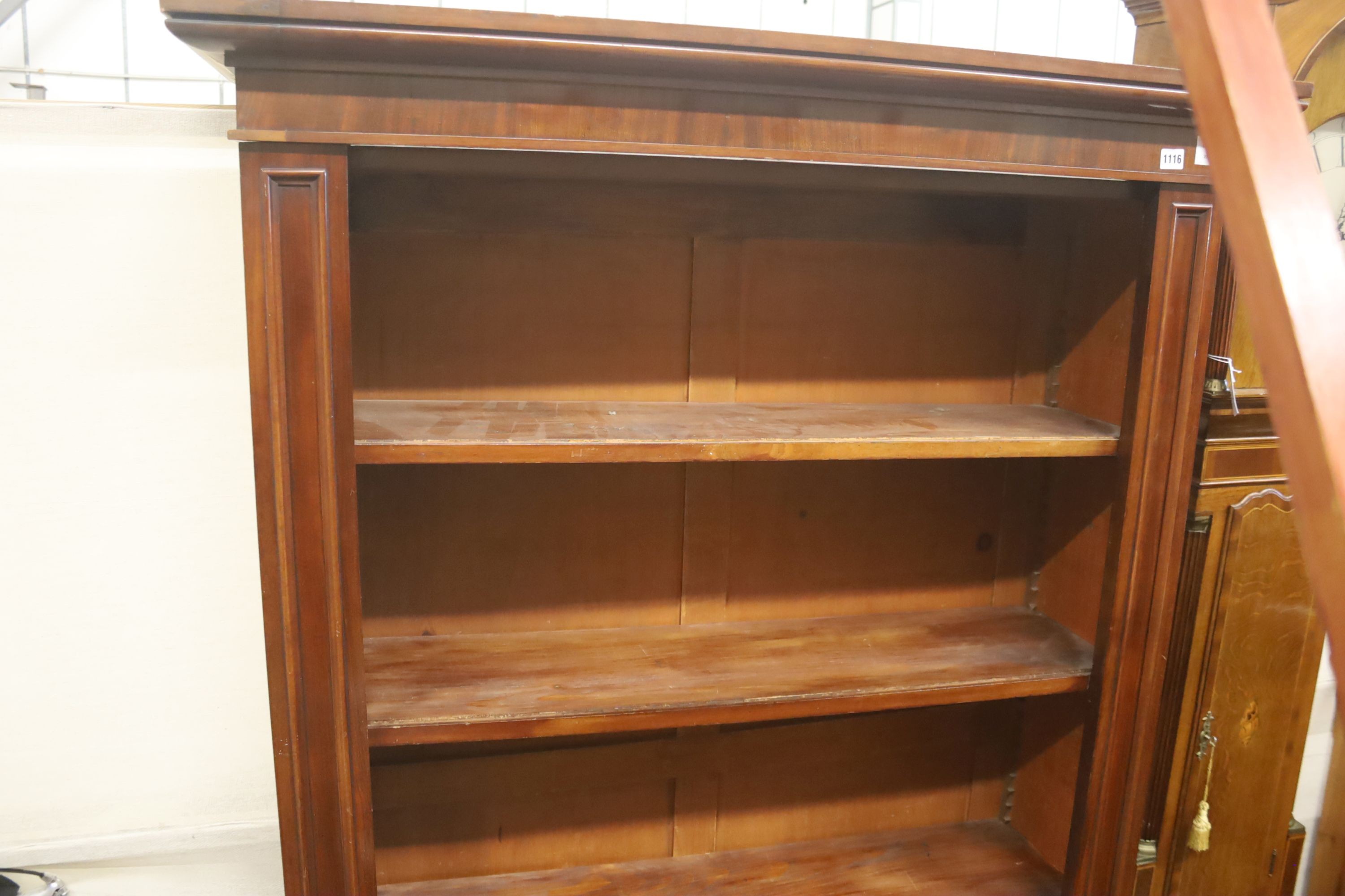 A large late Victorian mahogany open bookcase, length 118cm, depth 36cm, height 187cm